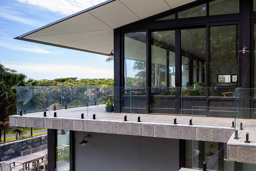 External view of house with black windows, and BAL-FZ lift slide sliding doors